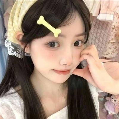 彼女